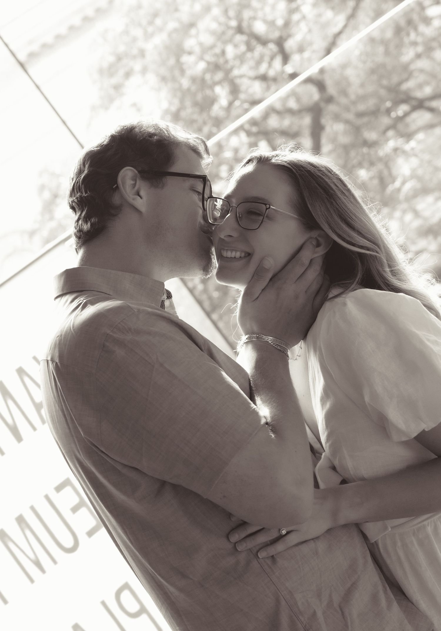Sequence of black and white photos capturing tender romantic moments.