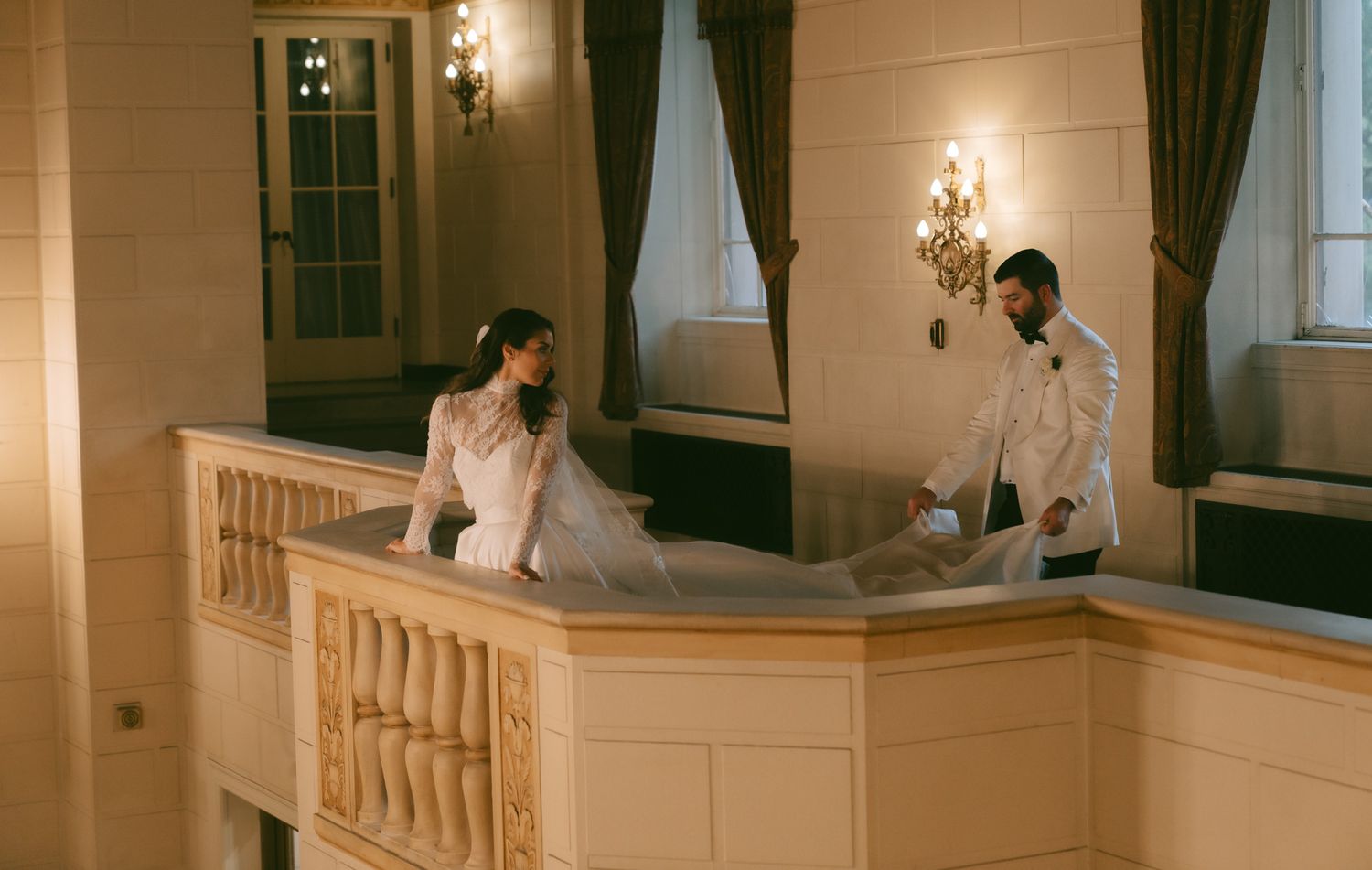 An elegant indoor balcony scene with vintage decor and warm lighting creates a romantic bridal atmosphere in downtown pittsburgh, pa.