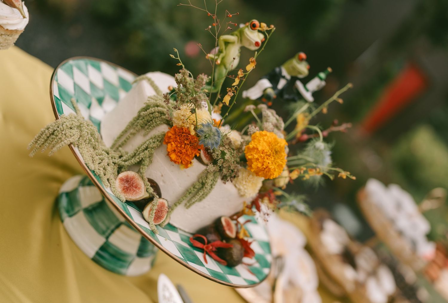 Elegant table decorations with delicate floral arrangements at wedding reception.