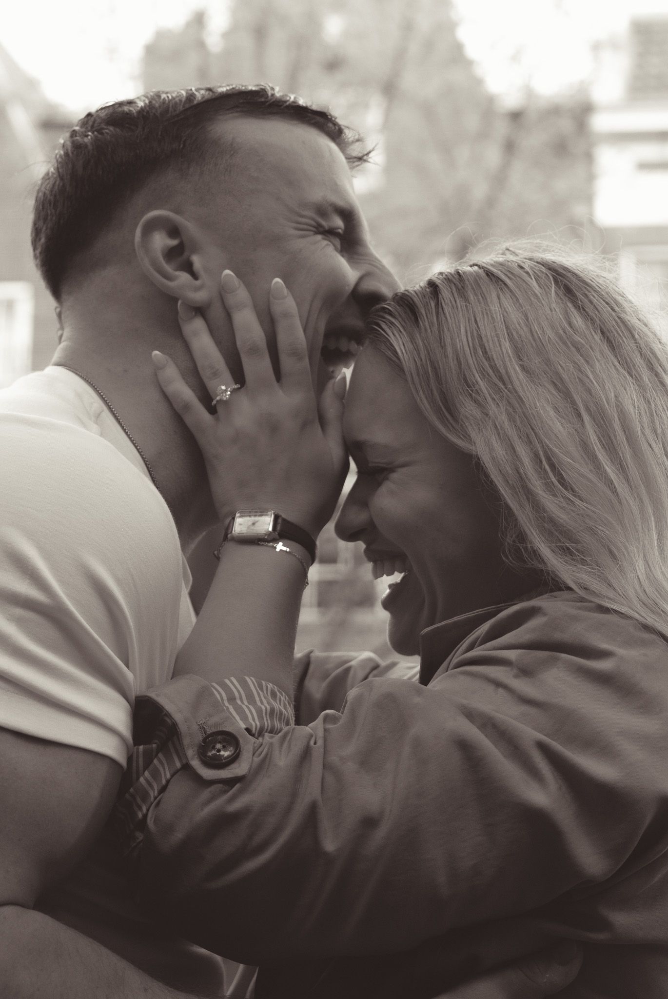 Intimate black and white photo series capturing tender moments between a couple in Amsterdam.