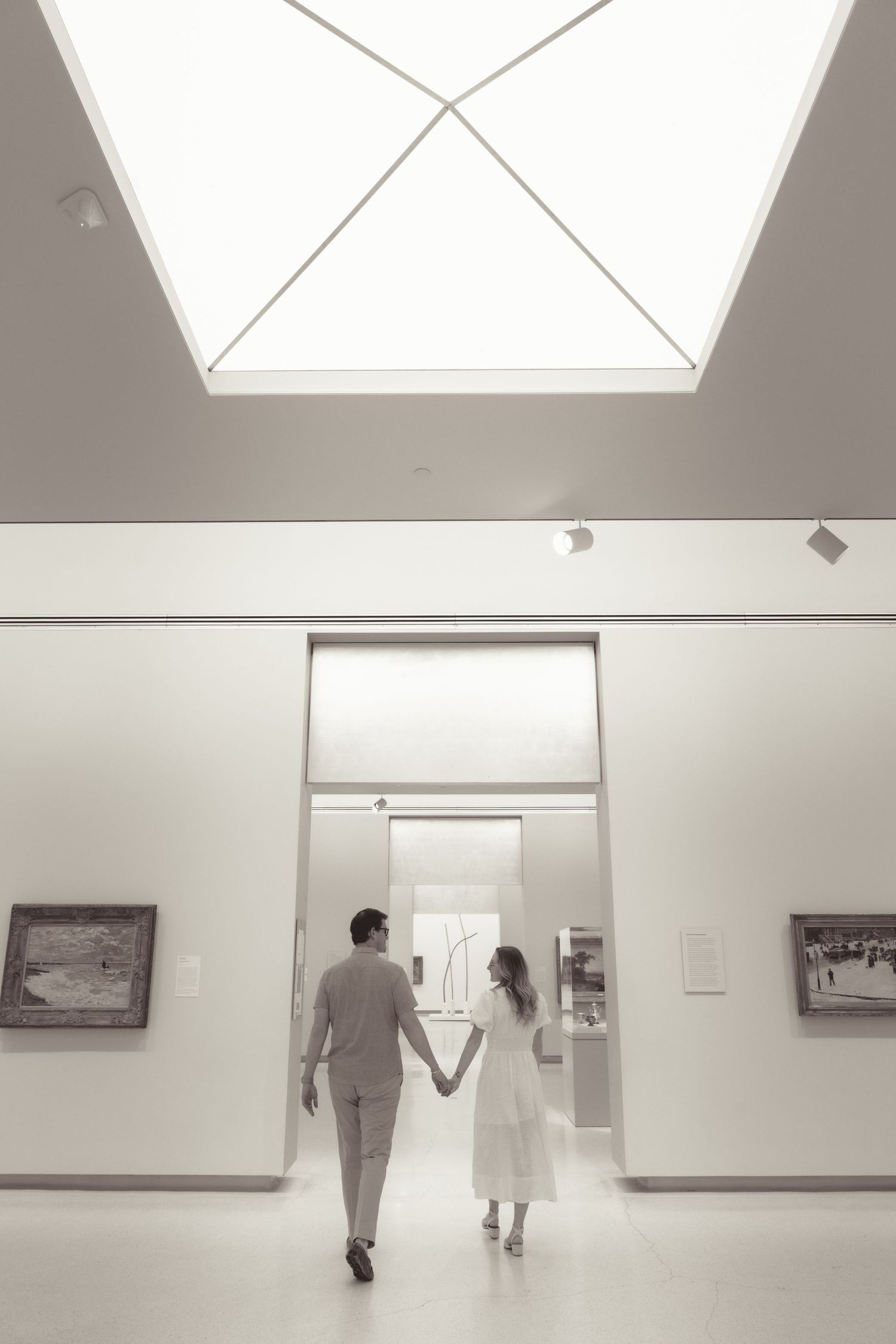 Series of romantic black and white photos showing an intimate moment between two people.