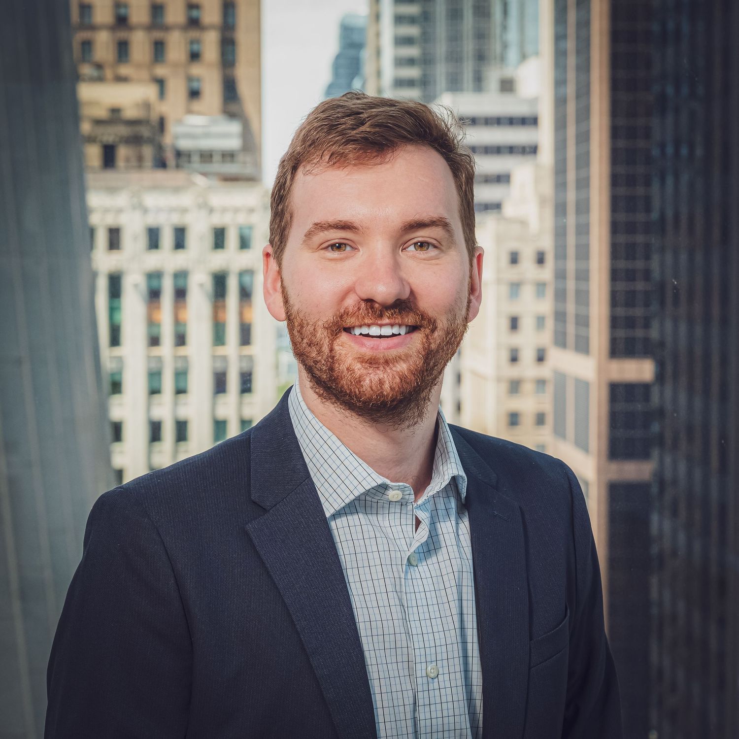 Professional portrait of person in business attire with urban backdrop. goose.img photography LLC - Chicago Photographer