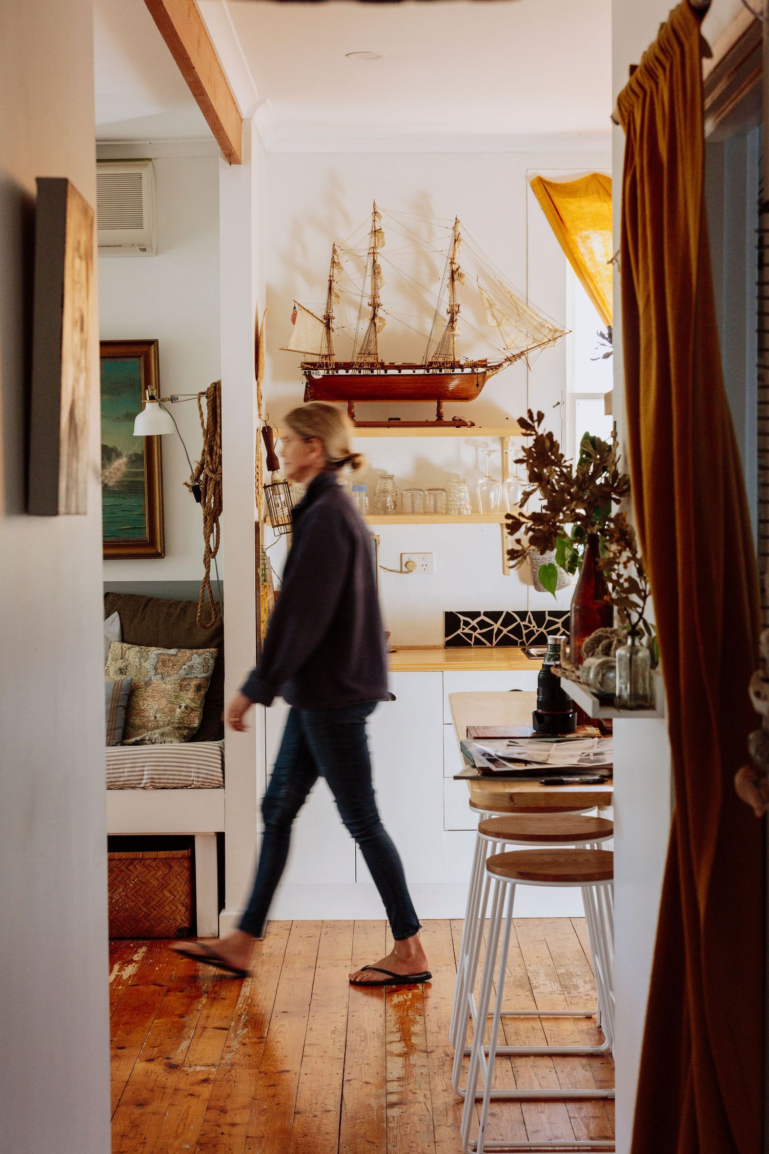 Woman walking through Airbnb My Sister and The Sea, MARION BAY, South Australia