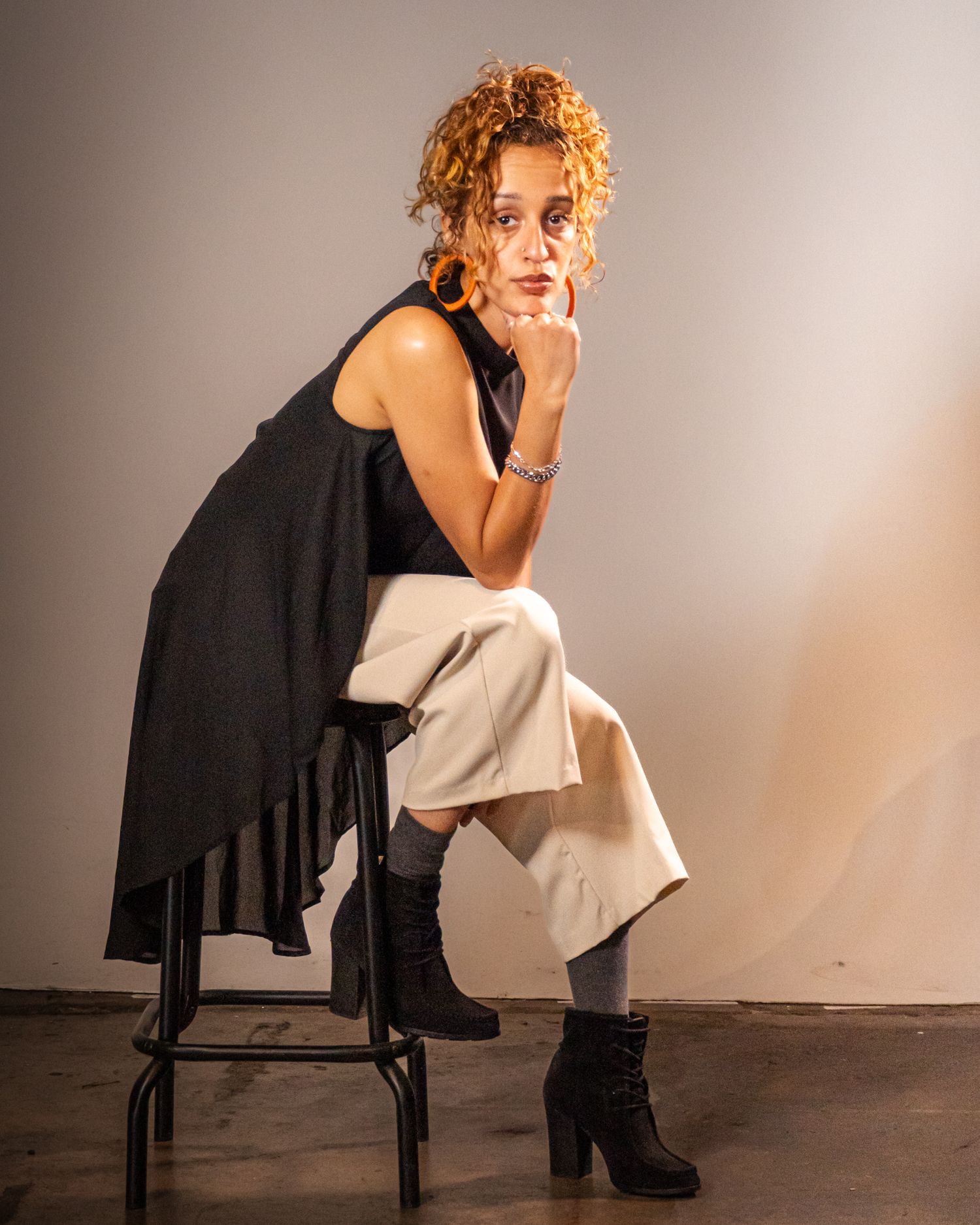 Professional corporate headshot photograph of a woman in a photo studio by Don Wilson in California