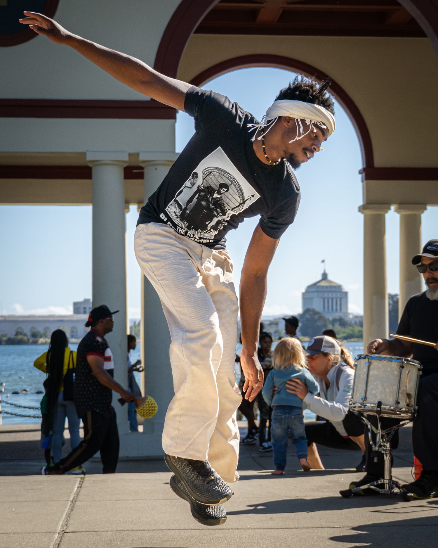 Professional portrait photograph of a man dancing at an outdoor event in California by Don Wilson