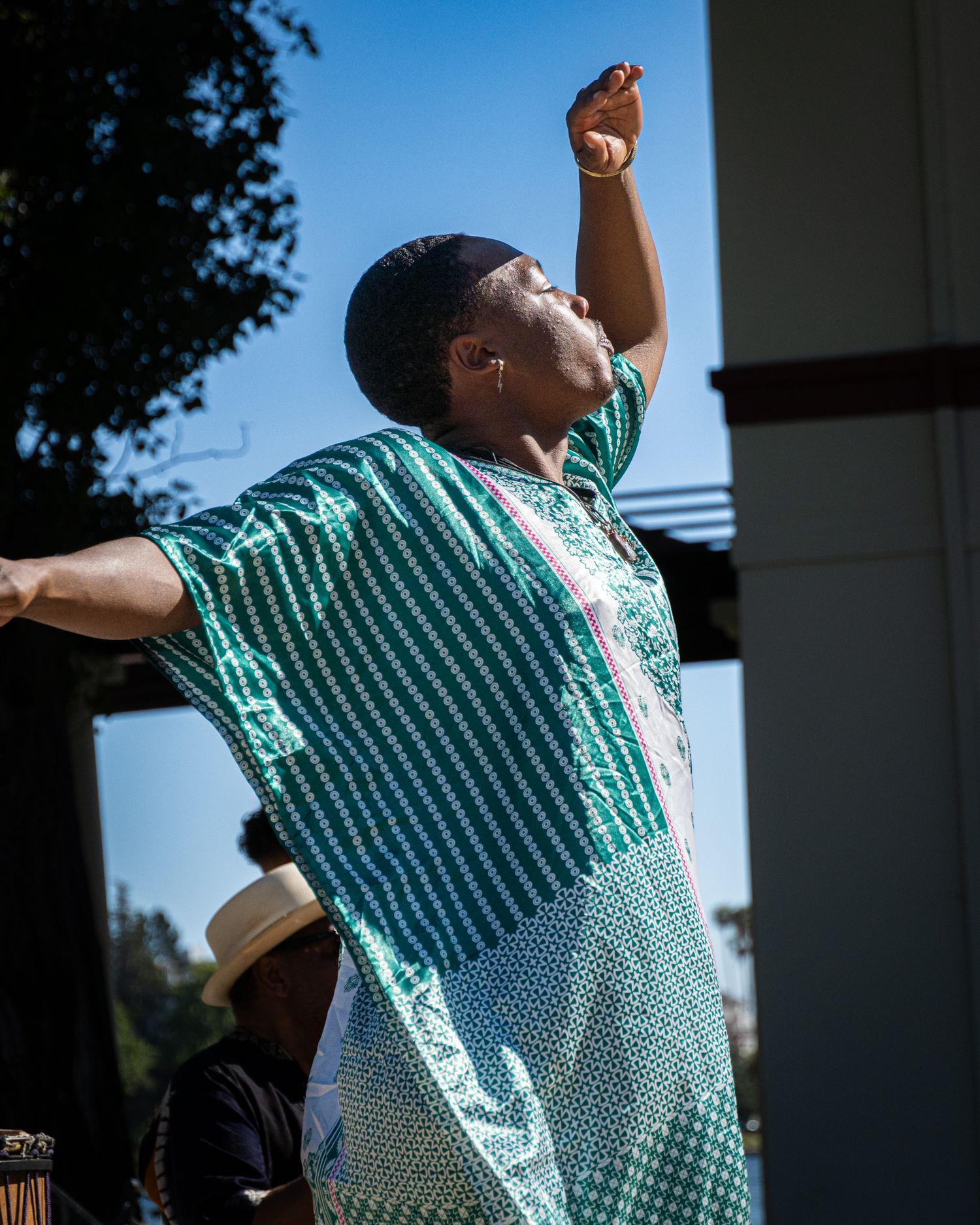 Professional portrait photograph of a man dancing at an outdoor event in California by Don Wilson