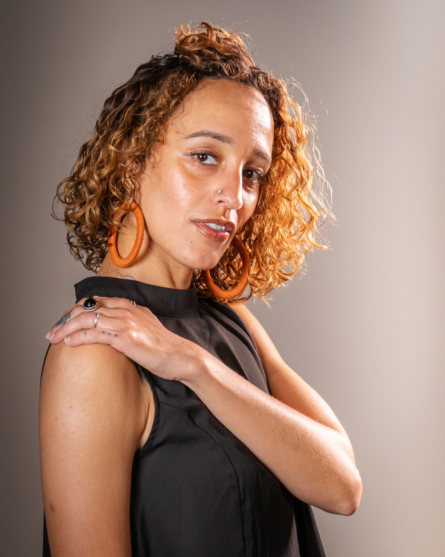 Professional corporate headshot photograph of a woman in a photo studio by Don Wilson in California