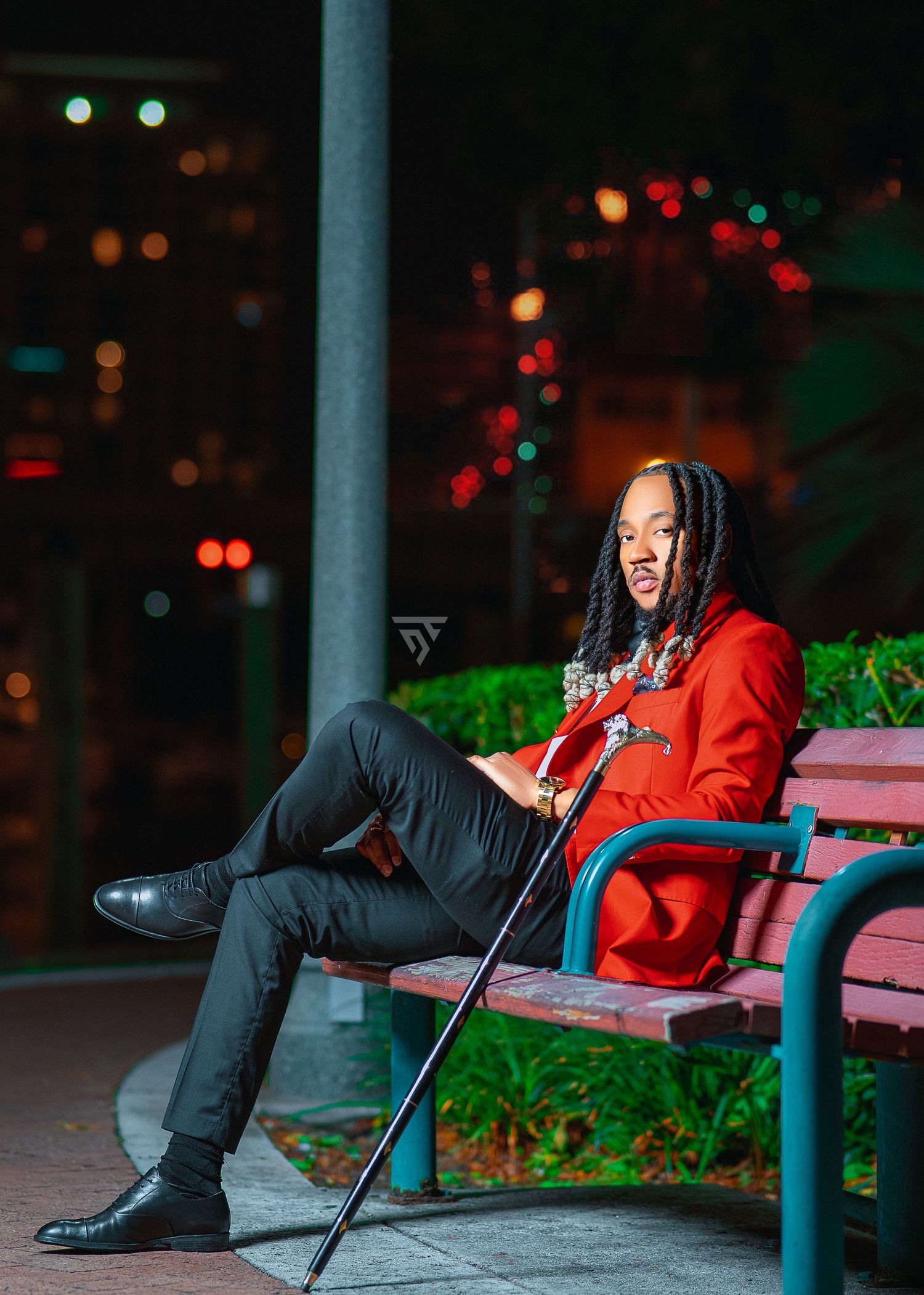 Artistic nighttime photo on a park bench with dramatic lighting and bokeh effects.