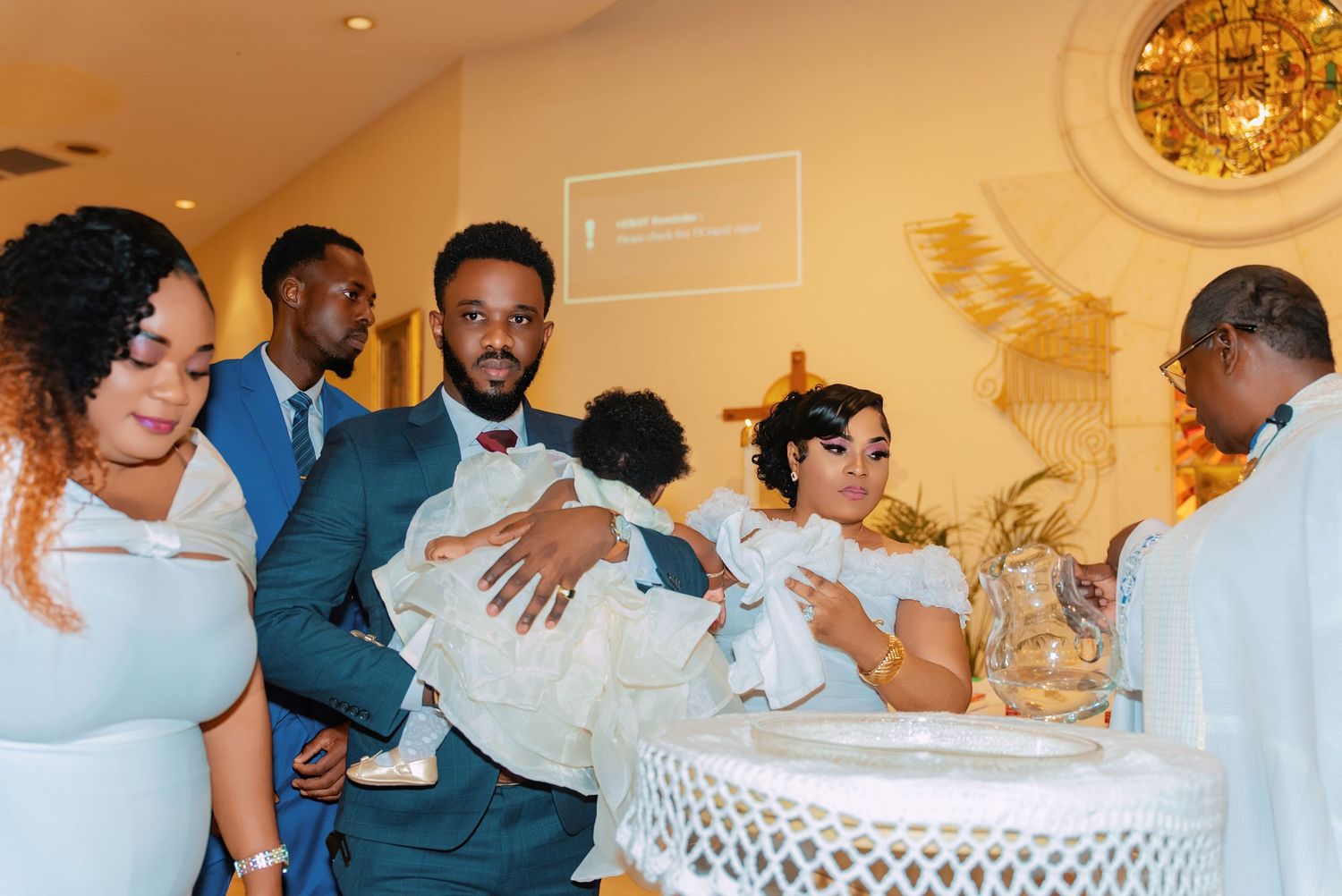 Wedding celebration scene with guests dancing and socializing in a church reception hall.