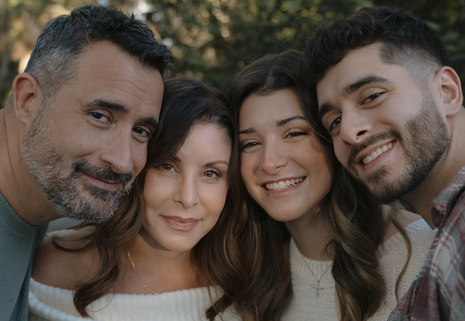 A group of people smiling and embracing in a candid outdoor photo collage.