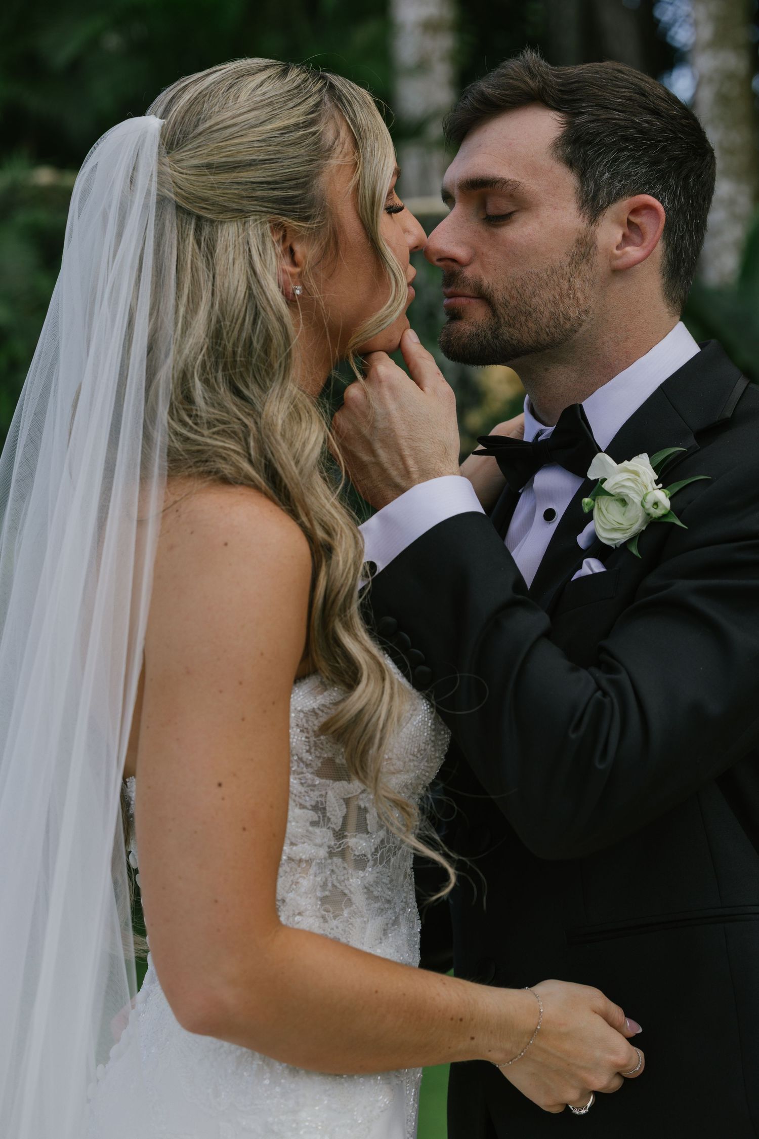 A romantic wedding photo sequence showing tender moments between newlyweds sharing kisses in their formal attire.