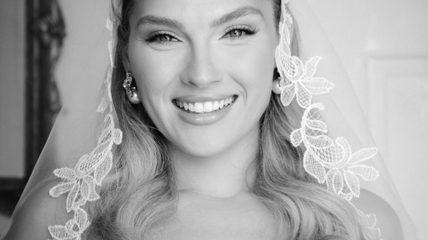 A black and white photo collage shows six headshots of a woman smiling and posing in different expressions.