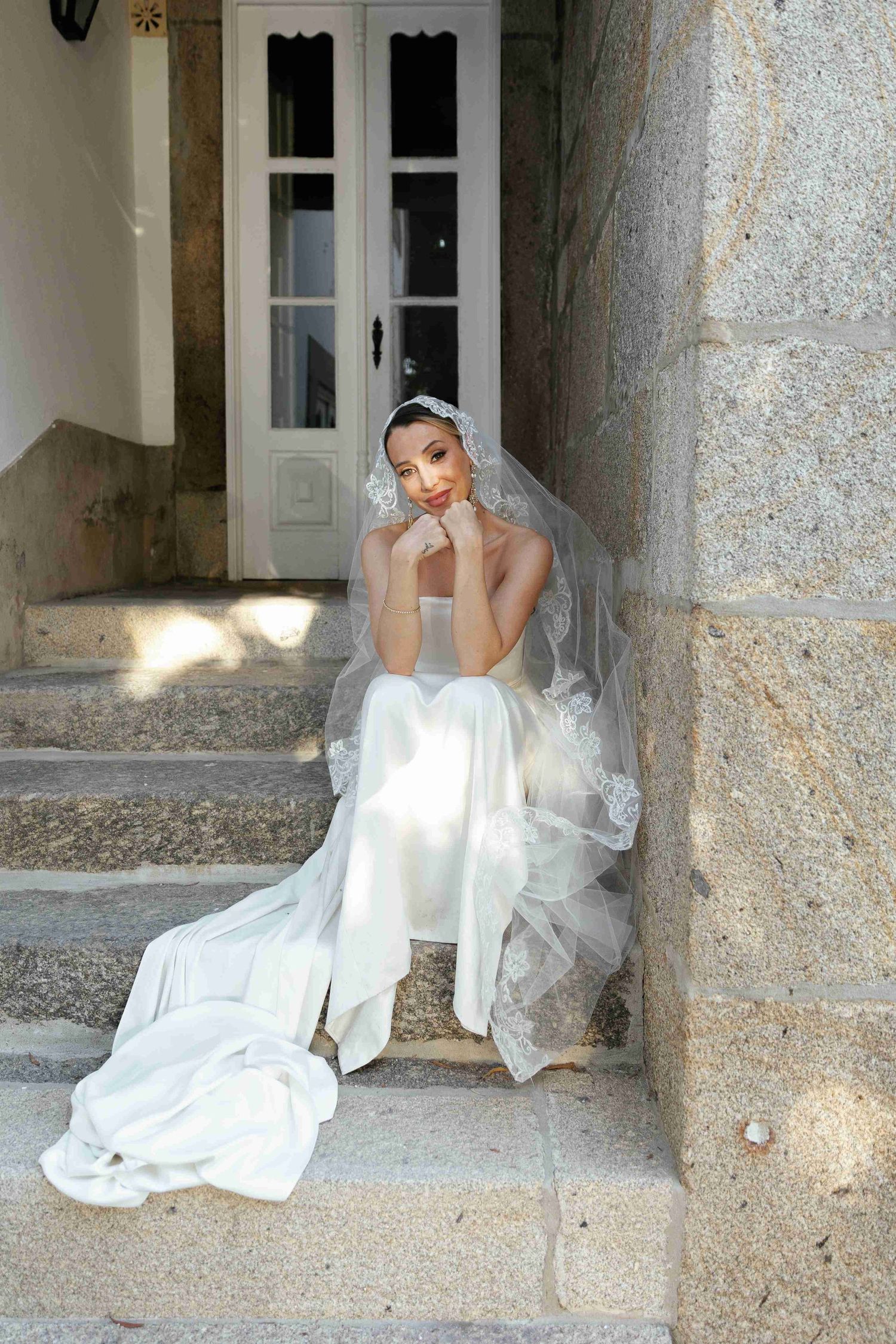 A collection of bridal portraits showing a person in white sitting gracefully on stone steps in natural light.