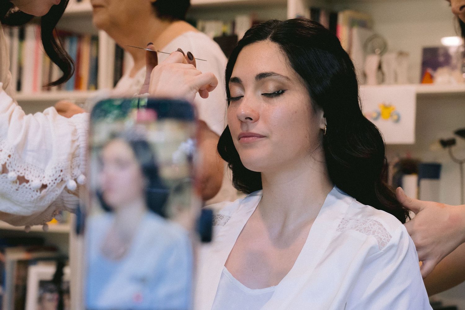 Series of getting ready photos showing wedding day preparations in a bright room.