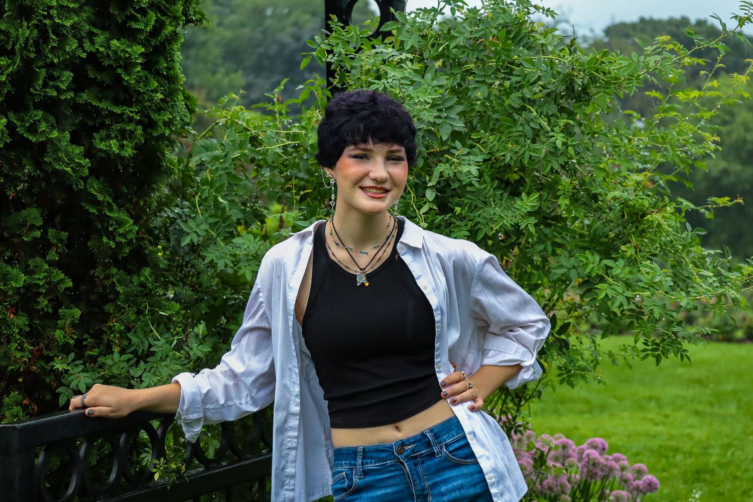 Senior portrait. Rainy, garden.