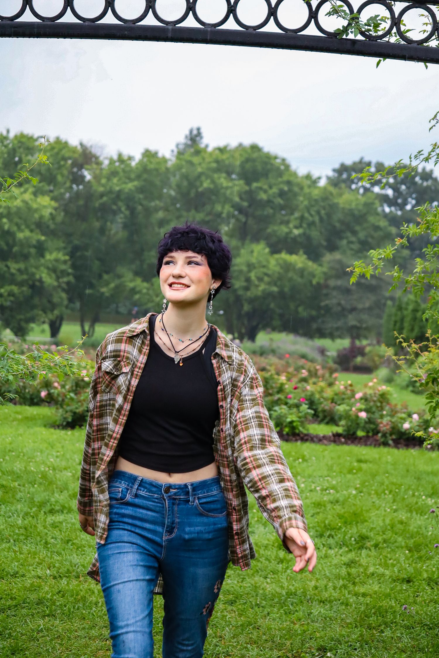 Senior portrait. Rainy, garden.