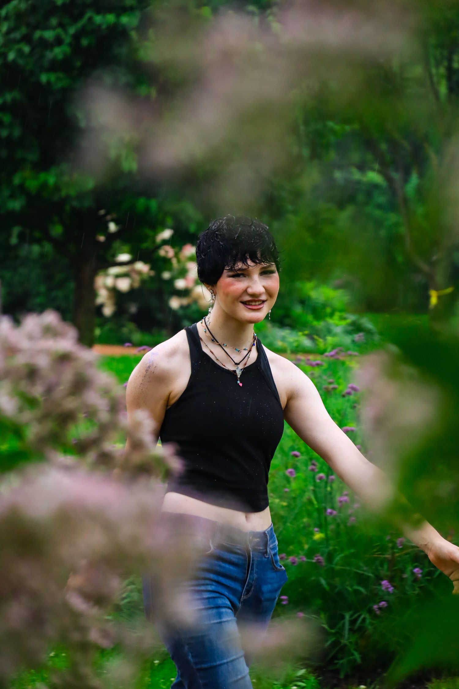 Senior portrait. Rainy, garden.
