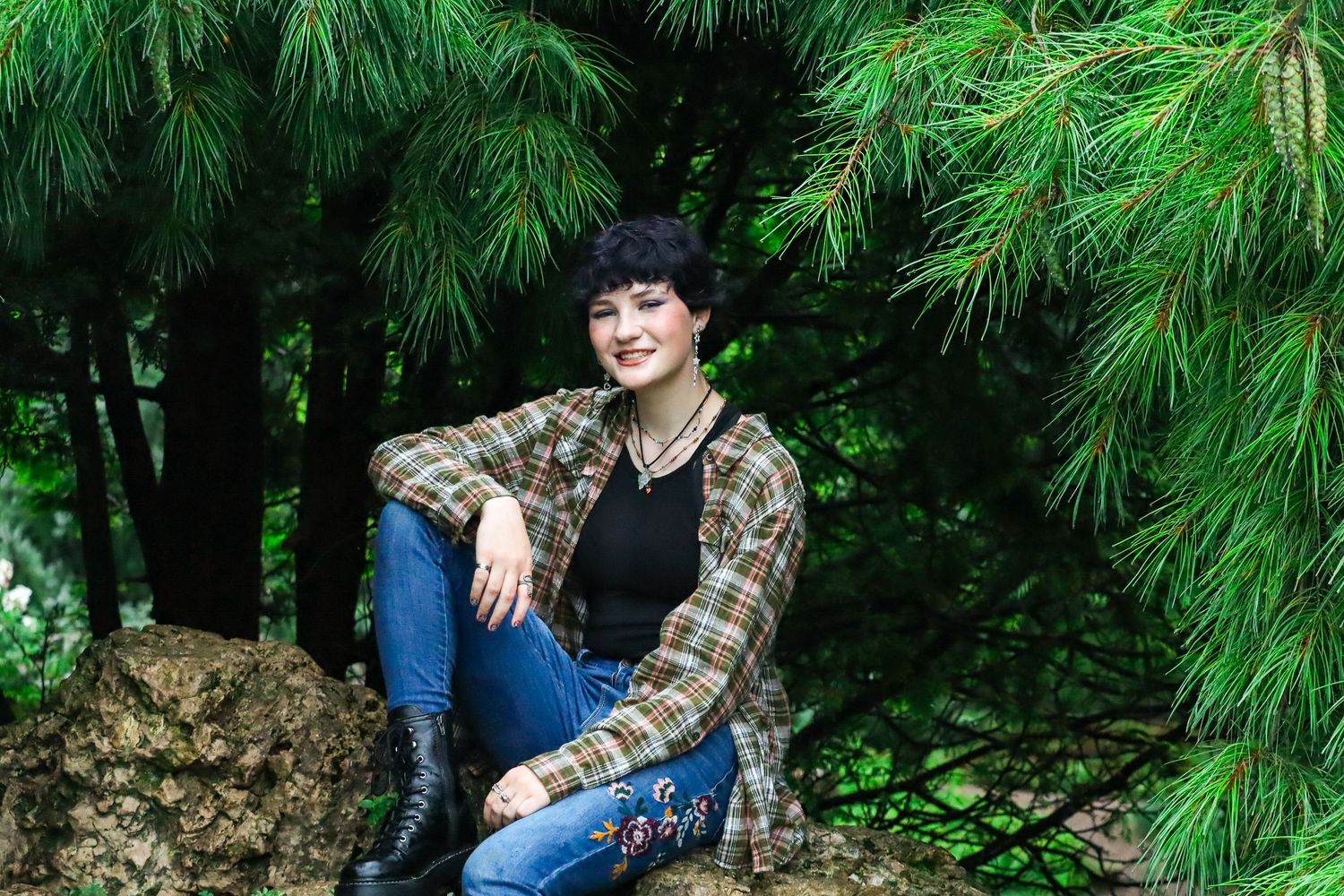 Senior portrait. Rainy, garden.