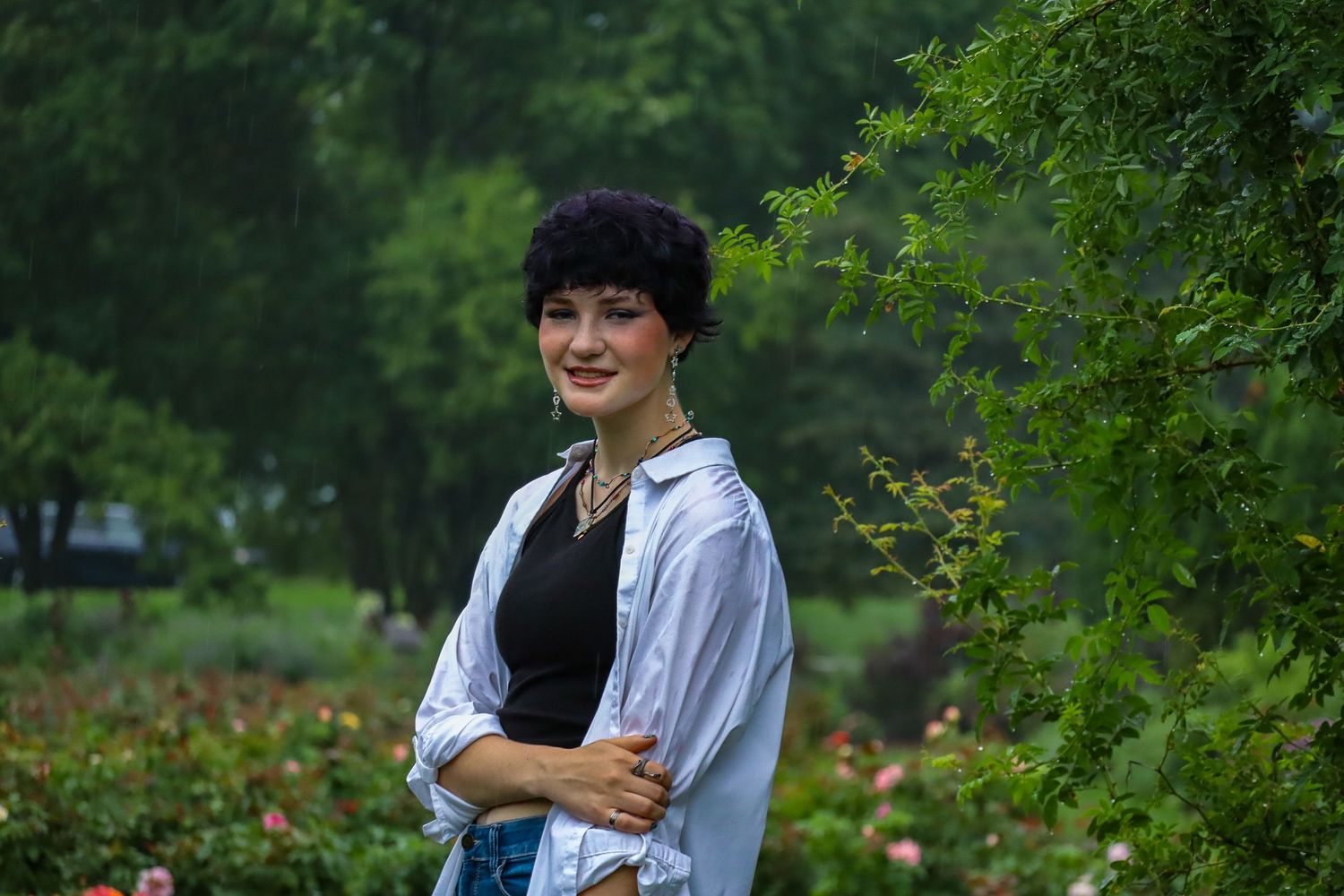 Senior portrait. Rainy, garden.