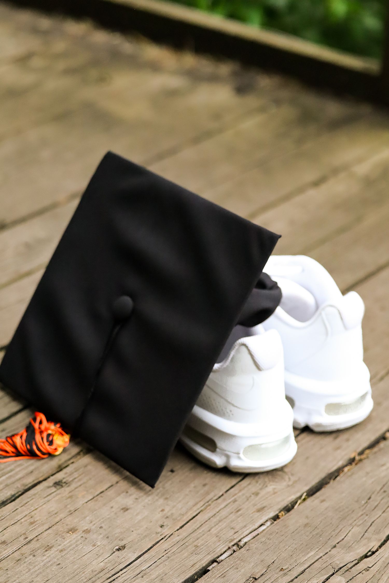 High school graduation portrait. Garden, park.
