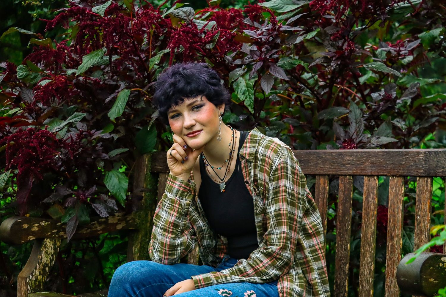 Senior portrait. Rainy, garden.