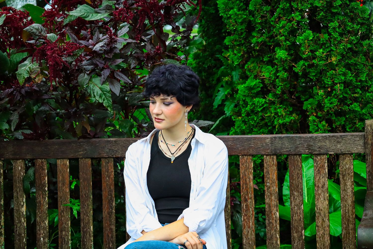 Senior portrait. Rainy, garden.