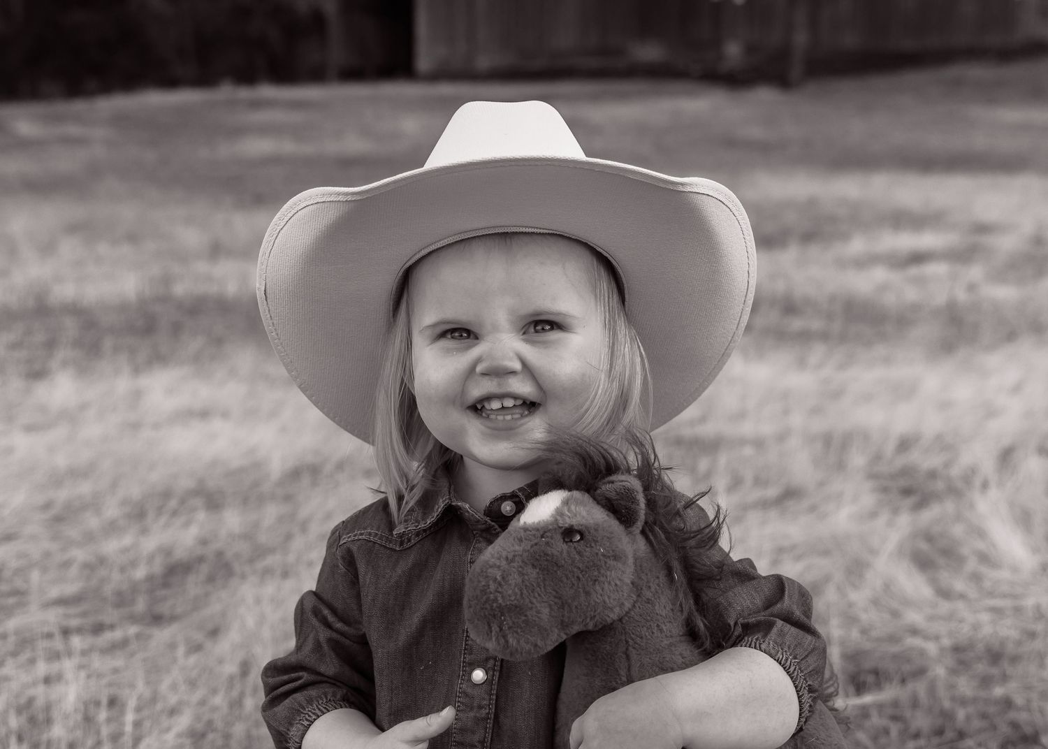 Candid black and white portraits showing joy and laughter outdoors.