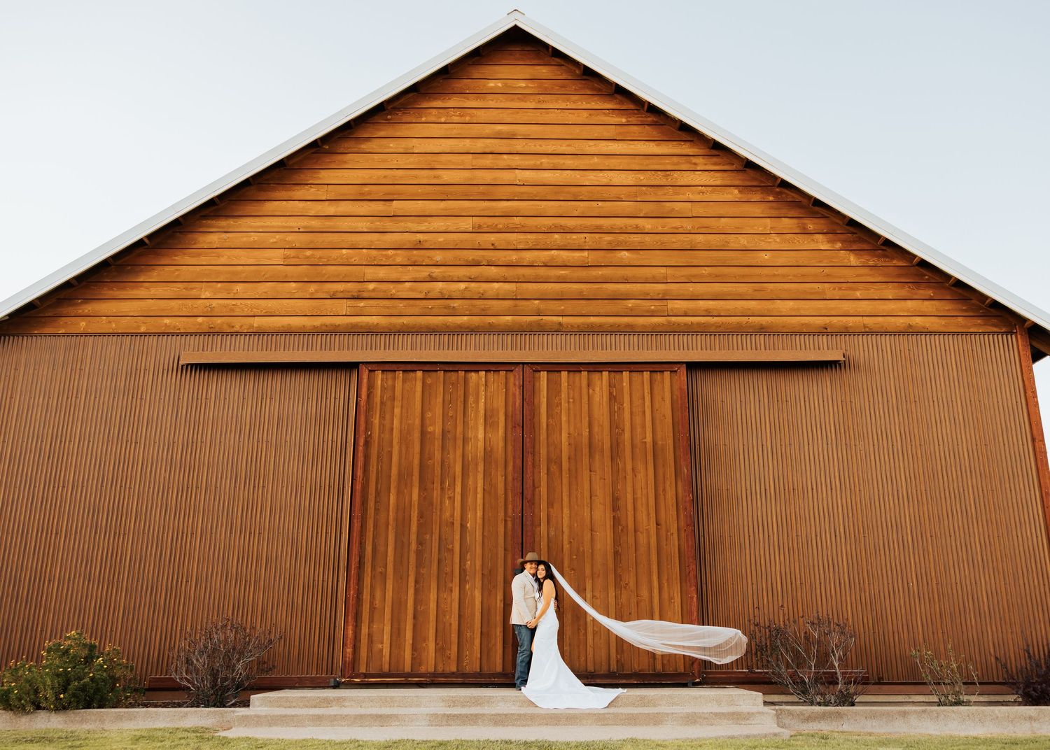 Series of architectural shots showing a wooden barn exterior with minimalist design.