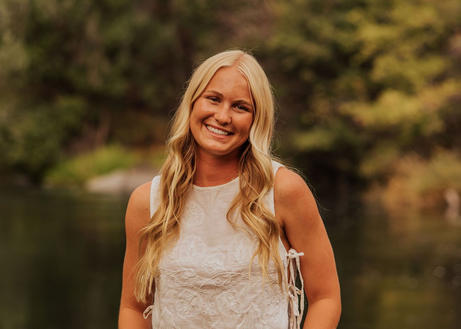 Warm autumn outdoor portraits with natural lighting and foliage.