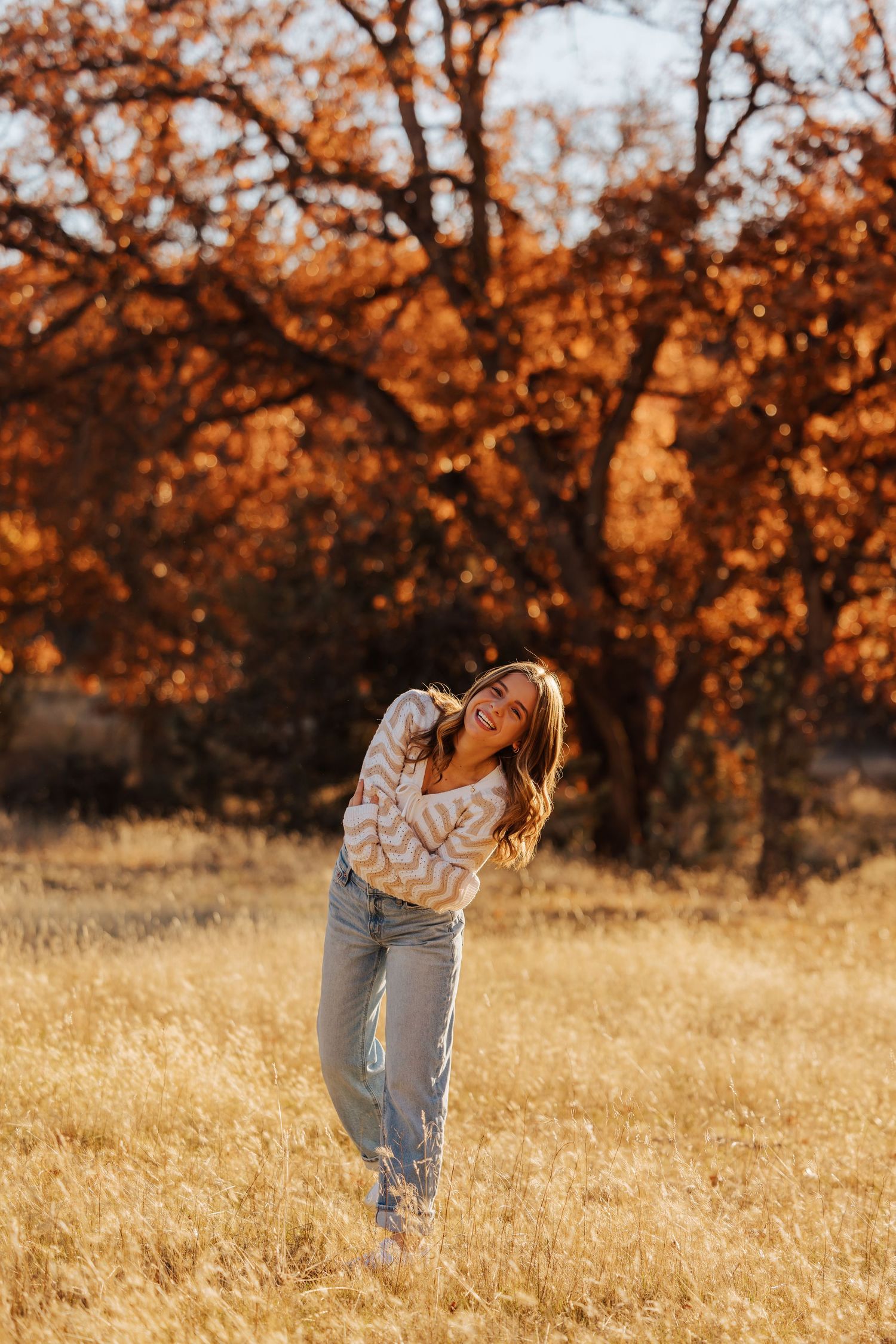 Dynamic movement shots in casual wear against vibrant fall foliage.