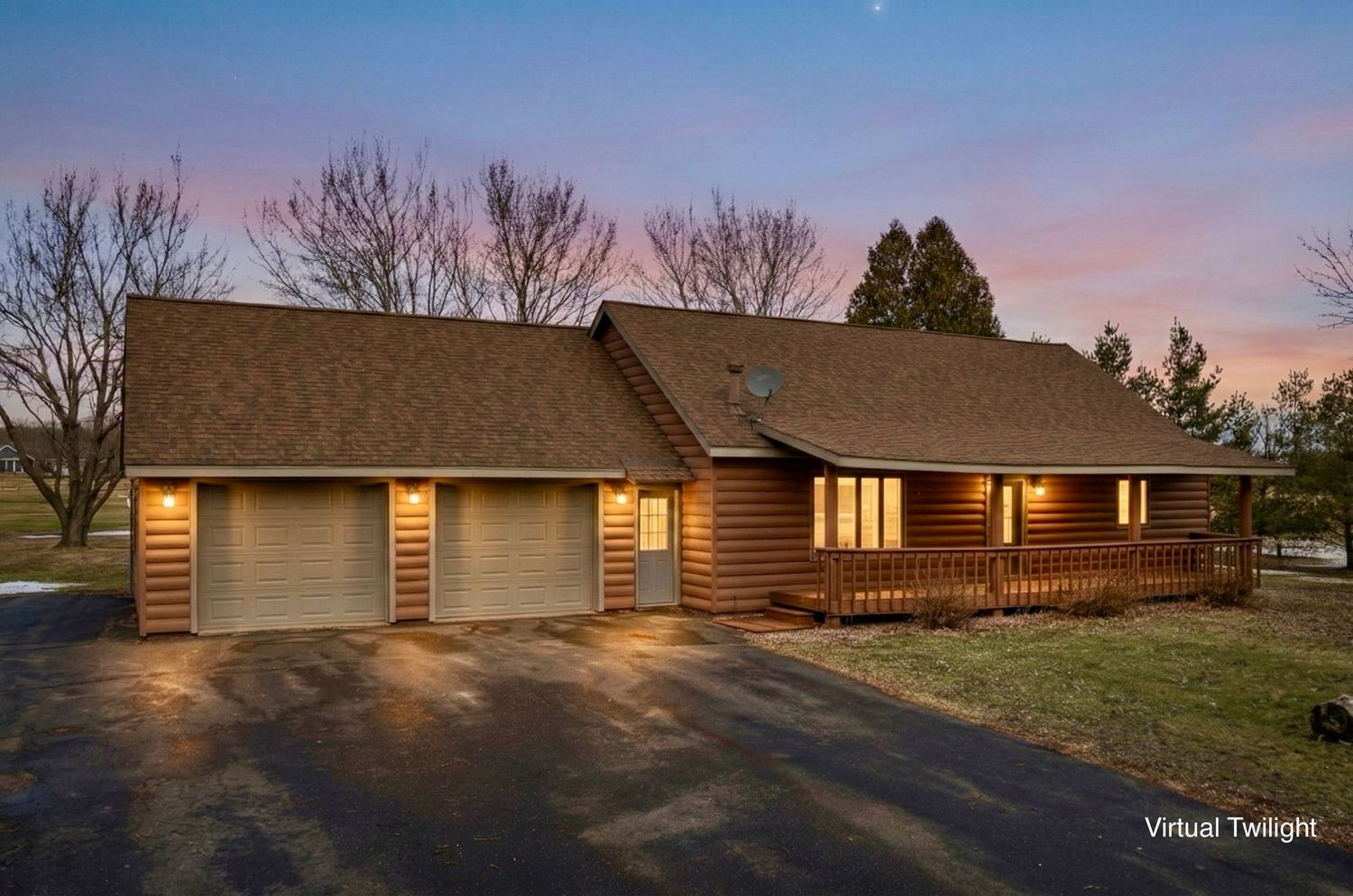 A ranch-style home exterior with warm lighting at dusk creates a cozy and inviting atmosphere.