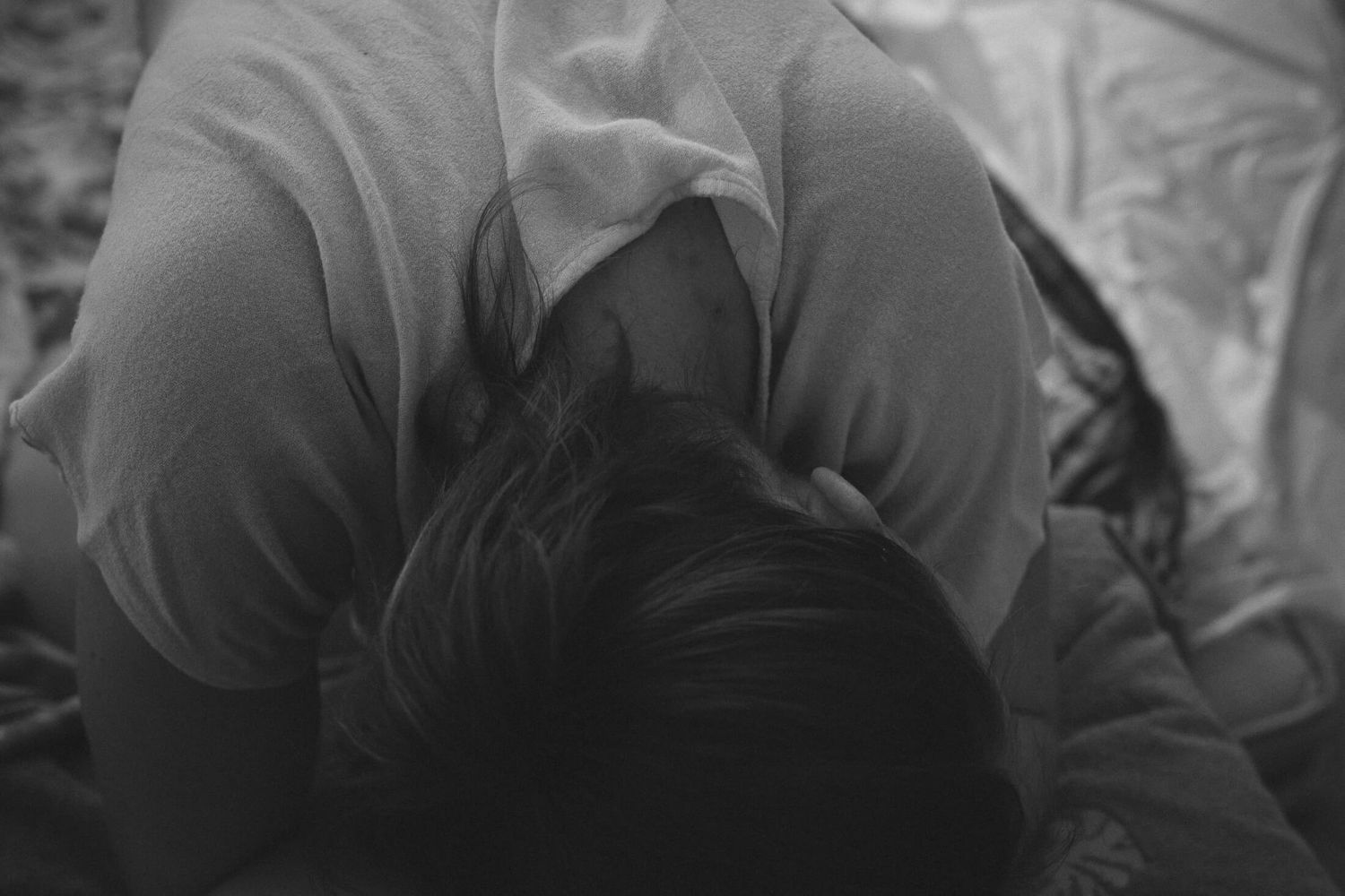 A series of intimate black and white photographs showing quiet moments.