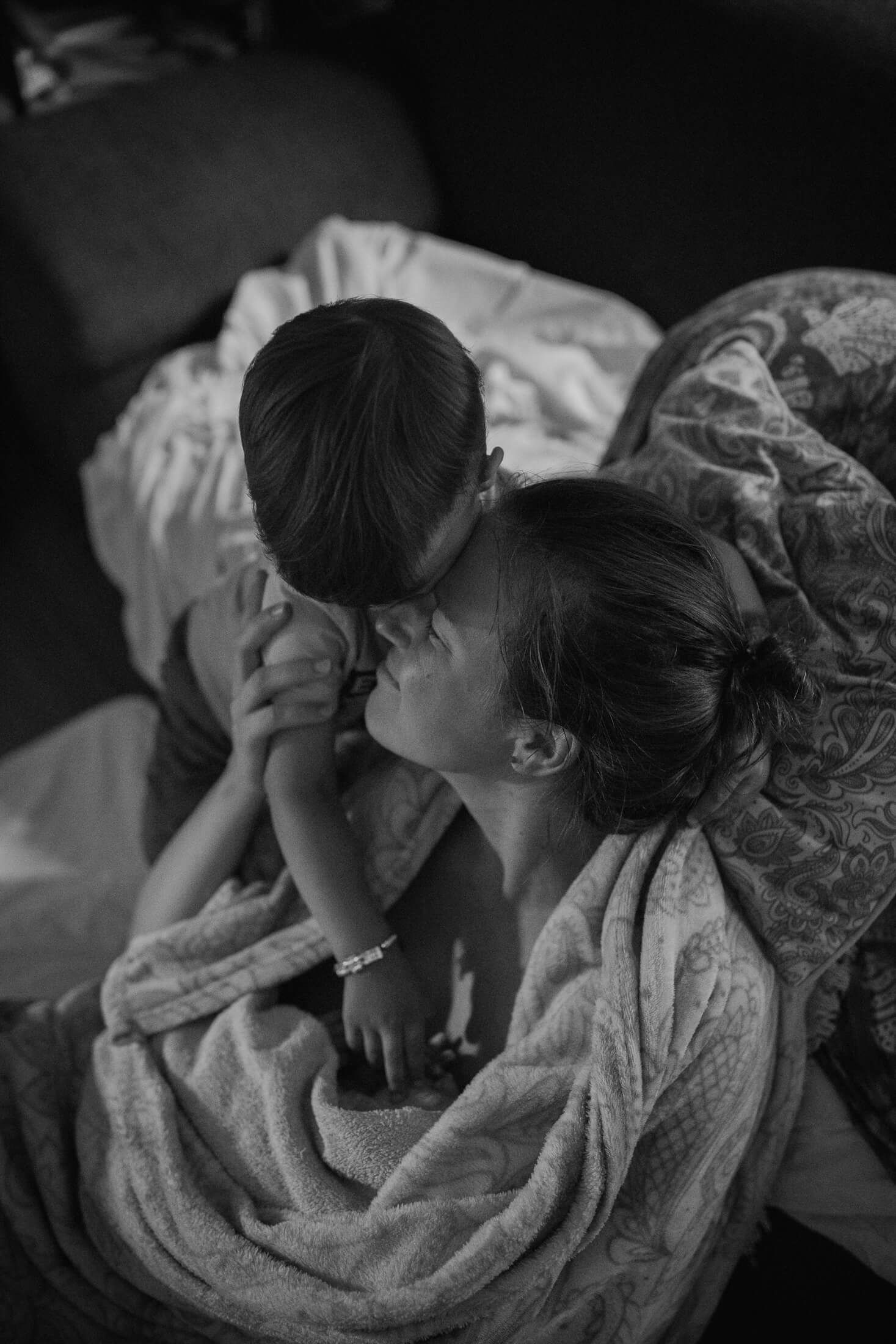 Peaceful black and white image capturing a quiet moment during labor.