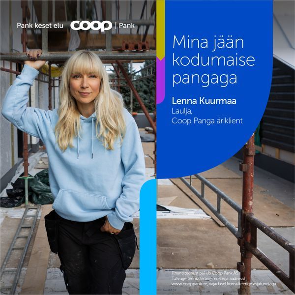 Person in light blue hoodie posing against Coop store branding and signage.