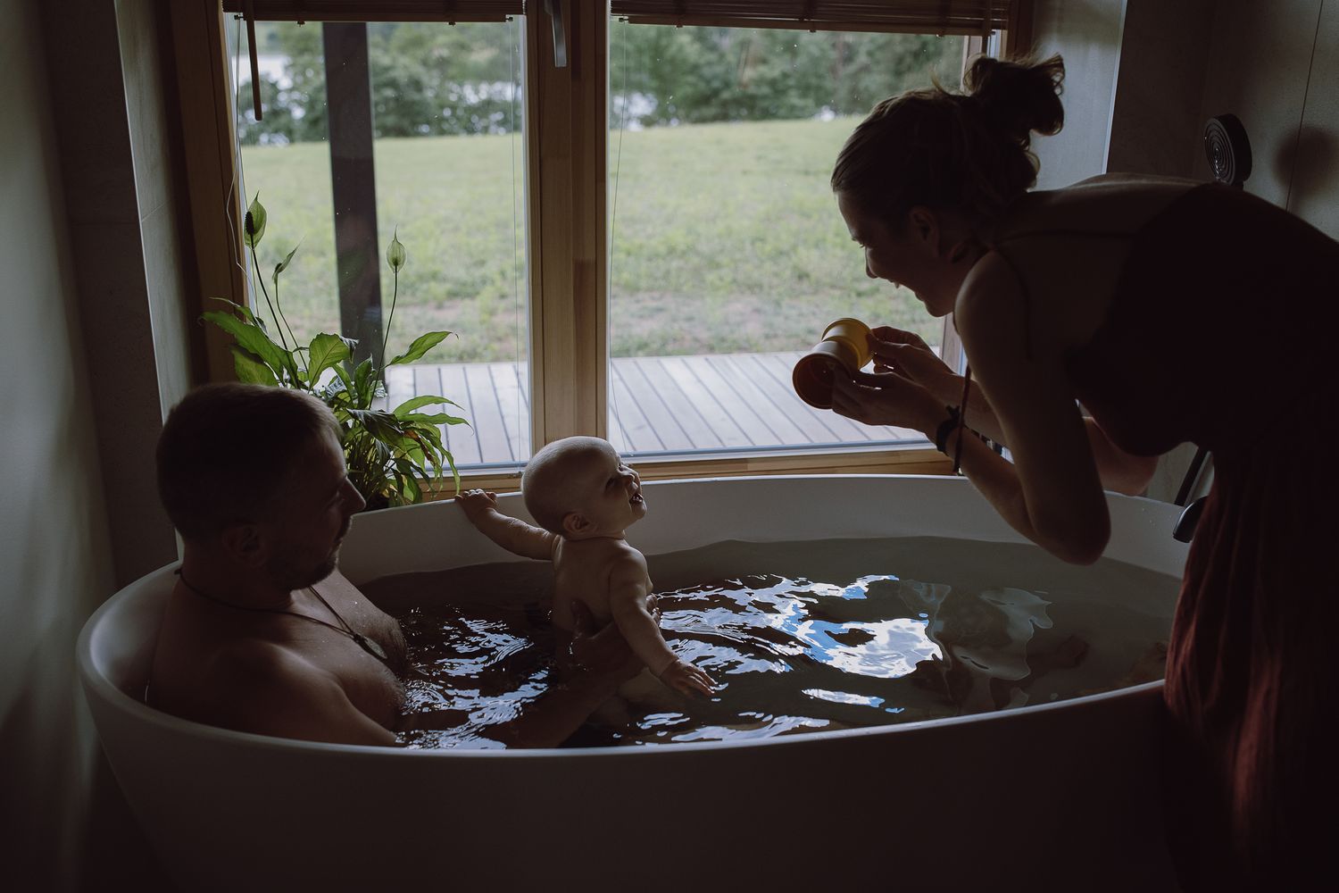 People enjoying a relaxing day indoors with natural light streaming through windows.