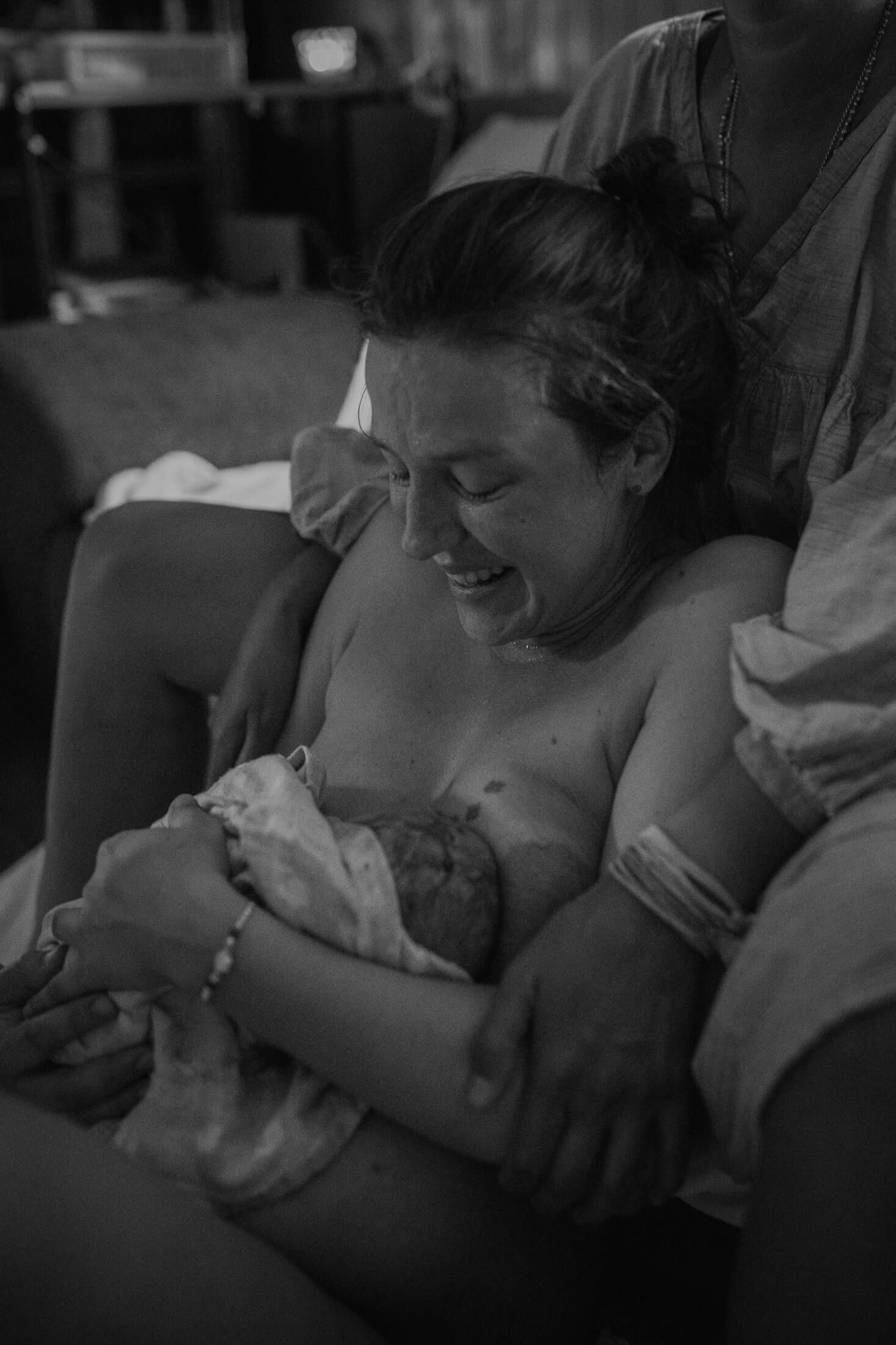 An intimate black and white series of moments captured in a home setting.