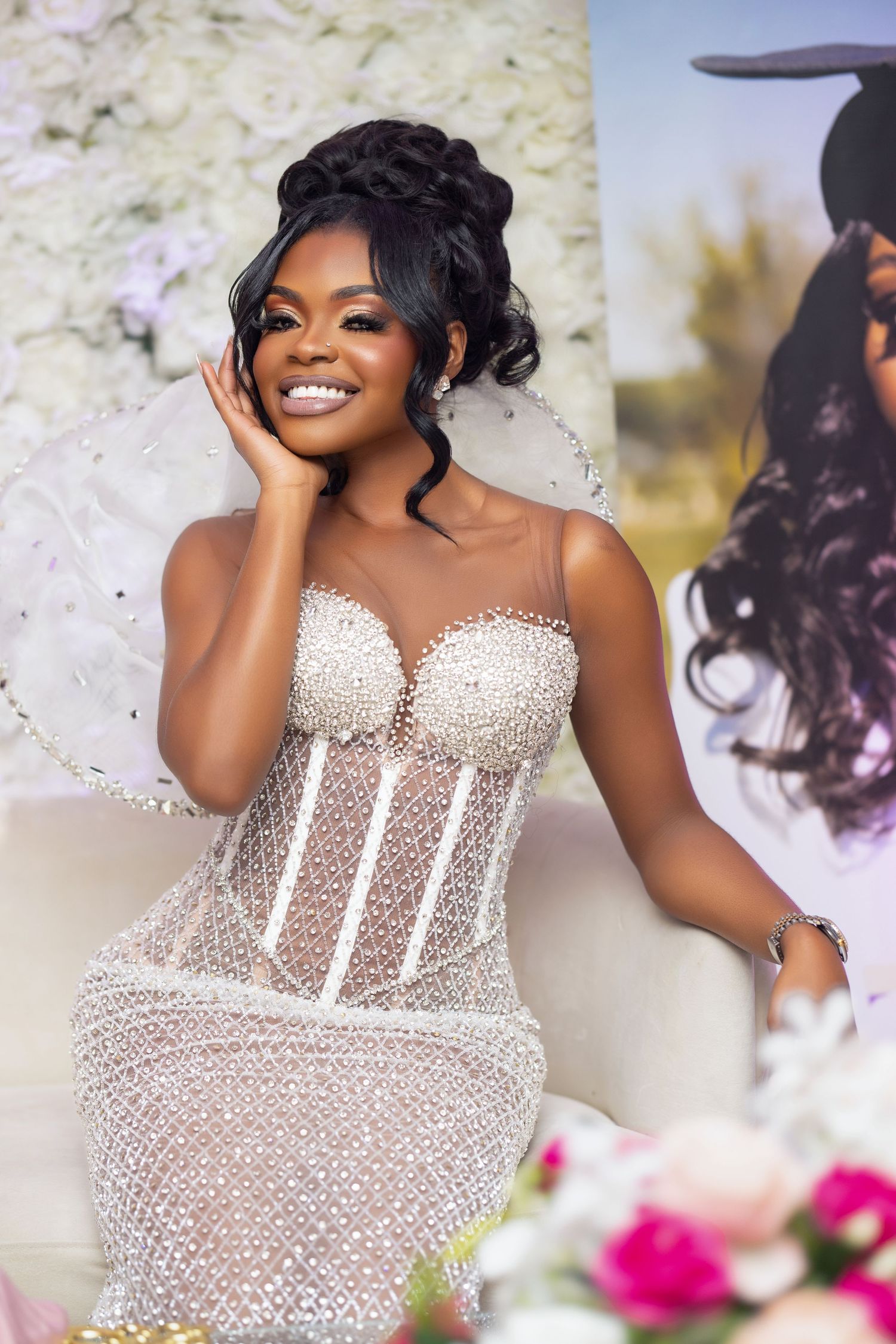 A stunning beaded wedding gown with a sweetheart neckline sparkles in a romantic outdoor photoshoot.