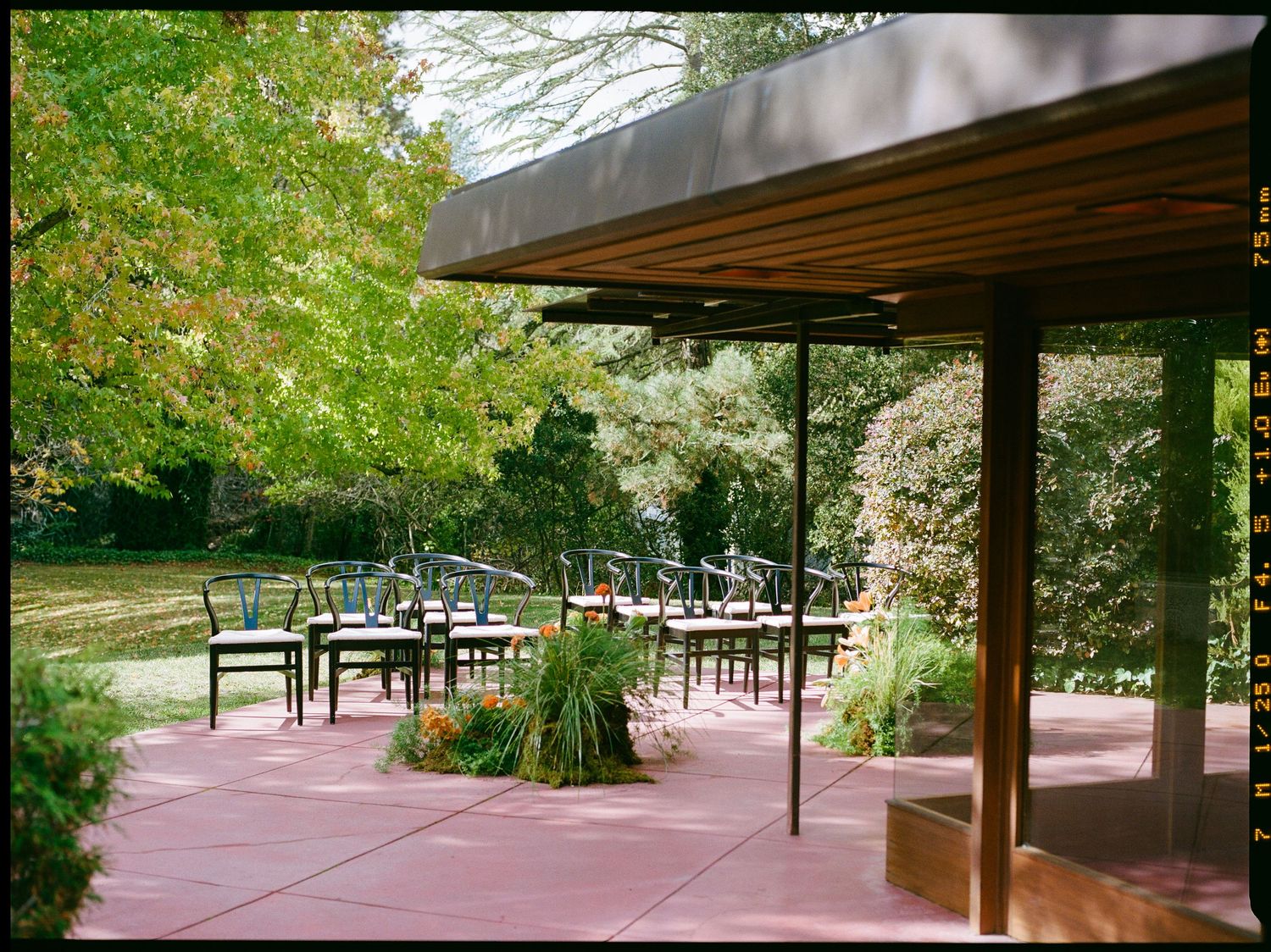 Intimate wedding ceremony setup in front of Frank Lloyd Wright House.