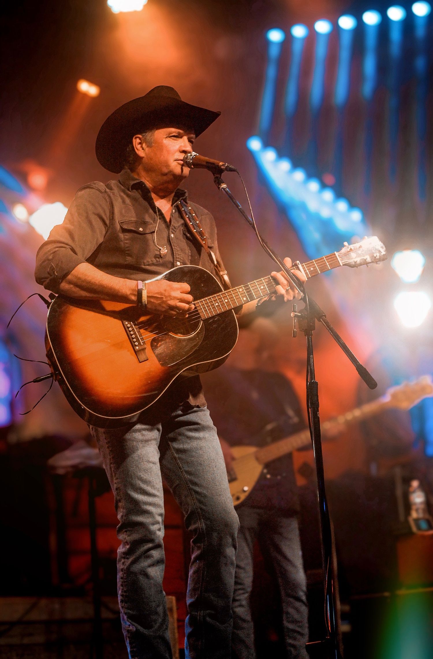 GG's Media Marketing
Tracy Byrd performing under neon lights