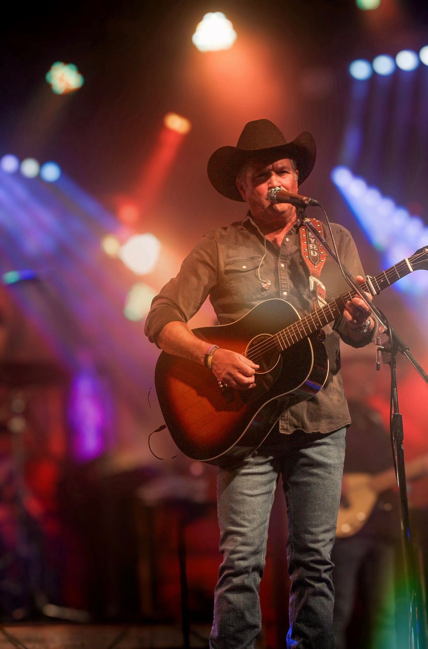 GG's Media Marketing
Tracy Byrd Music performing on stage under neon lights