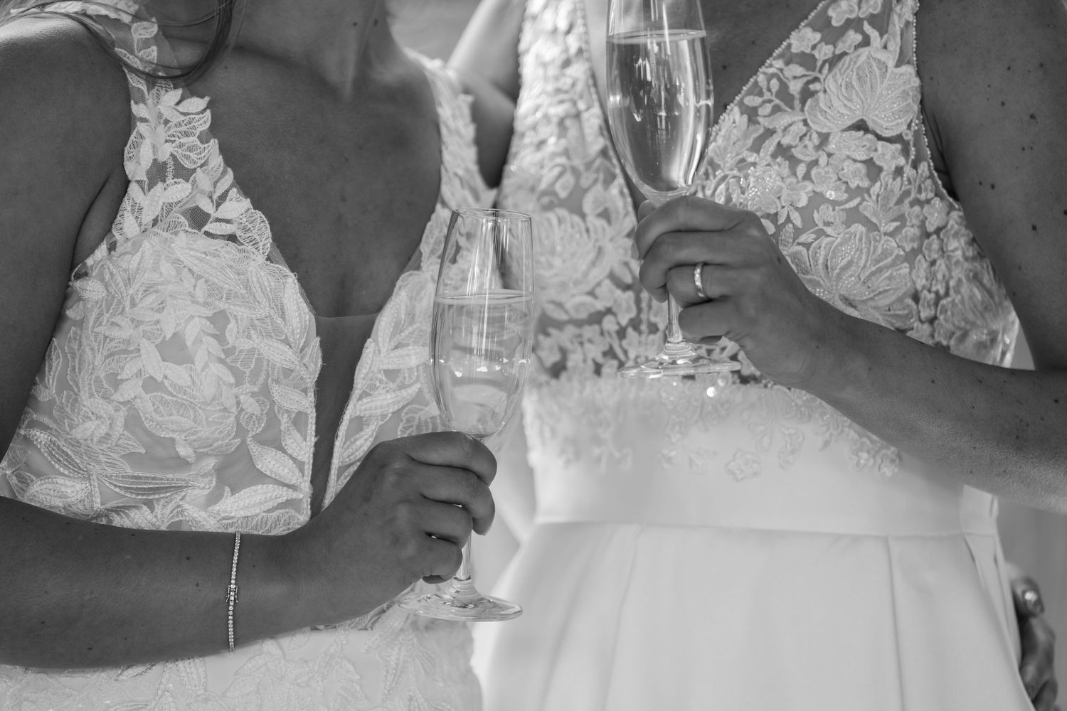 Close-up details of intricate lace wedding dress bodice in multiple angles.