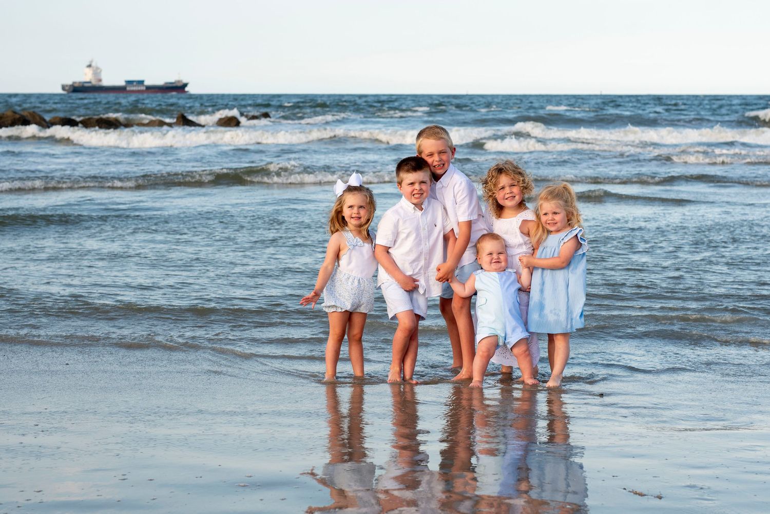 Family photography session at golden hour on Tybee Island, Georgia