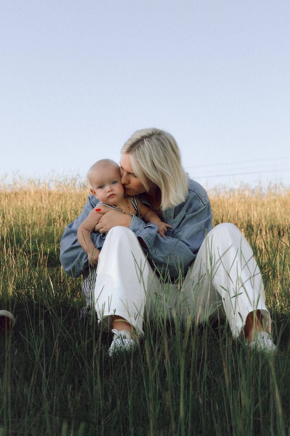 emotional motherhood photography in Toowoomba
mother holding baby natural lifestyle portrait
documentary motherhood photography outdoors