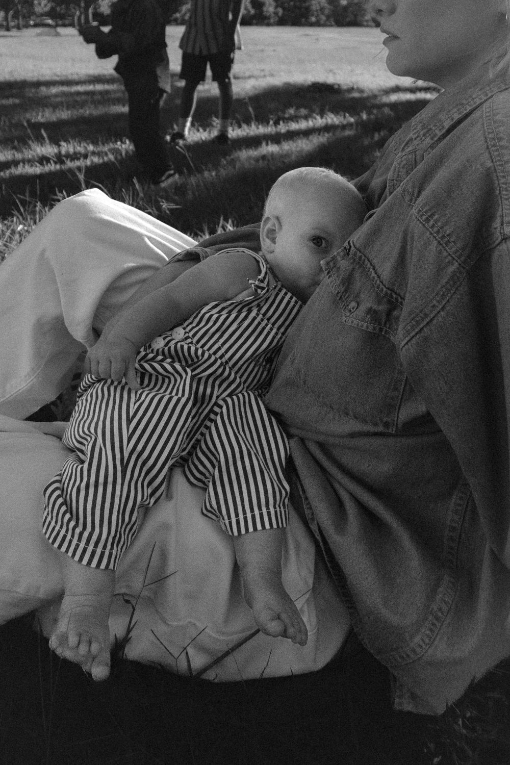 emotional motherhood photography in Toowoomba
mother holding baby natural lifestyle portrait
documentary motherhood photography outdoors
