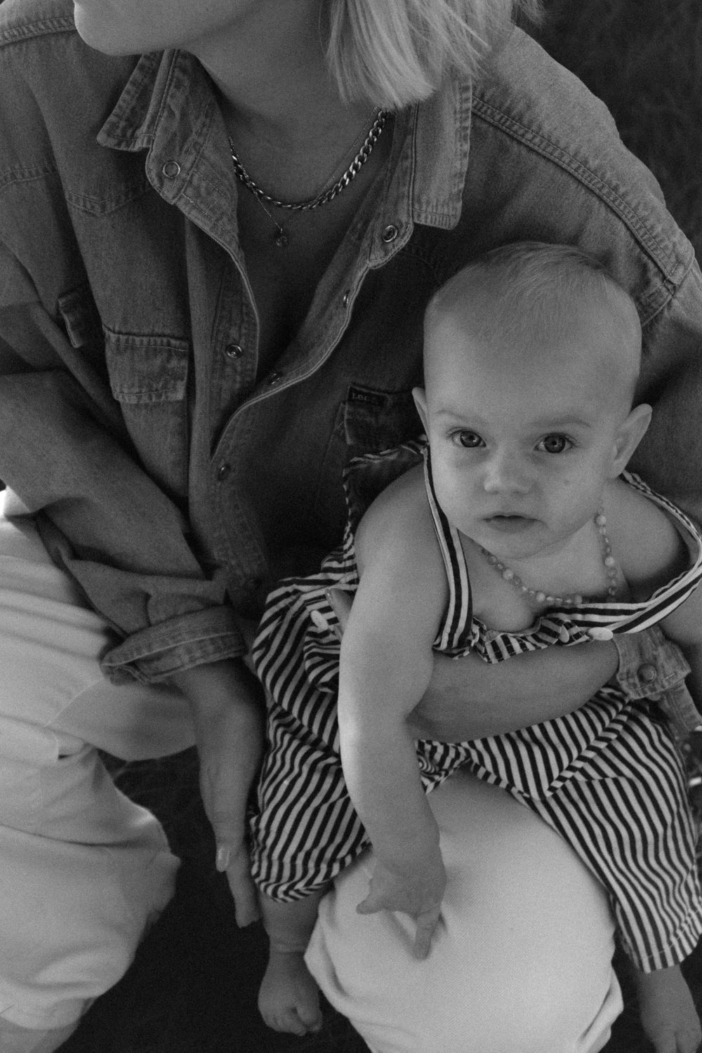 emotional motherhood photography in Toowoomba
mother holding baby natural lifestyle portrait
documentary motherhood photography outdoors