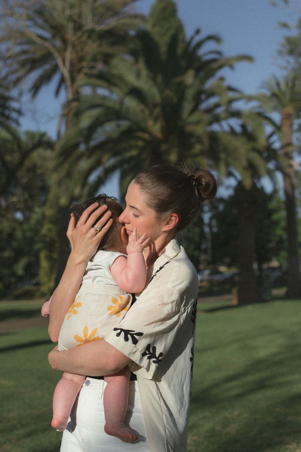 emotional motherhood photography in Toowoomba
mother holding baby natural lifestyle portrait
documentary motherhood photography outdoors