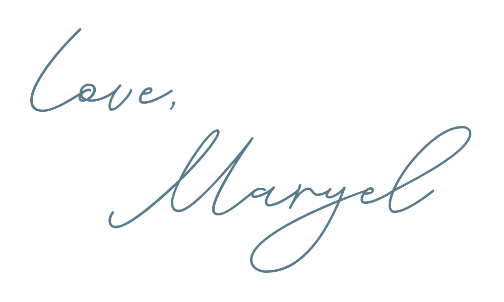 Elegant cursive signature reading 'Love, Maryel' in blue ink.