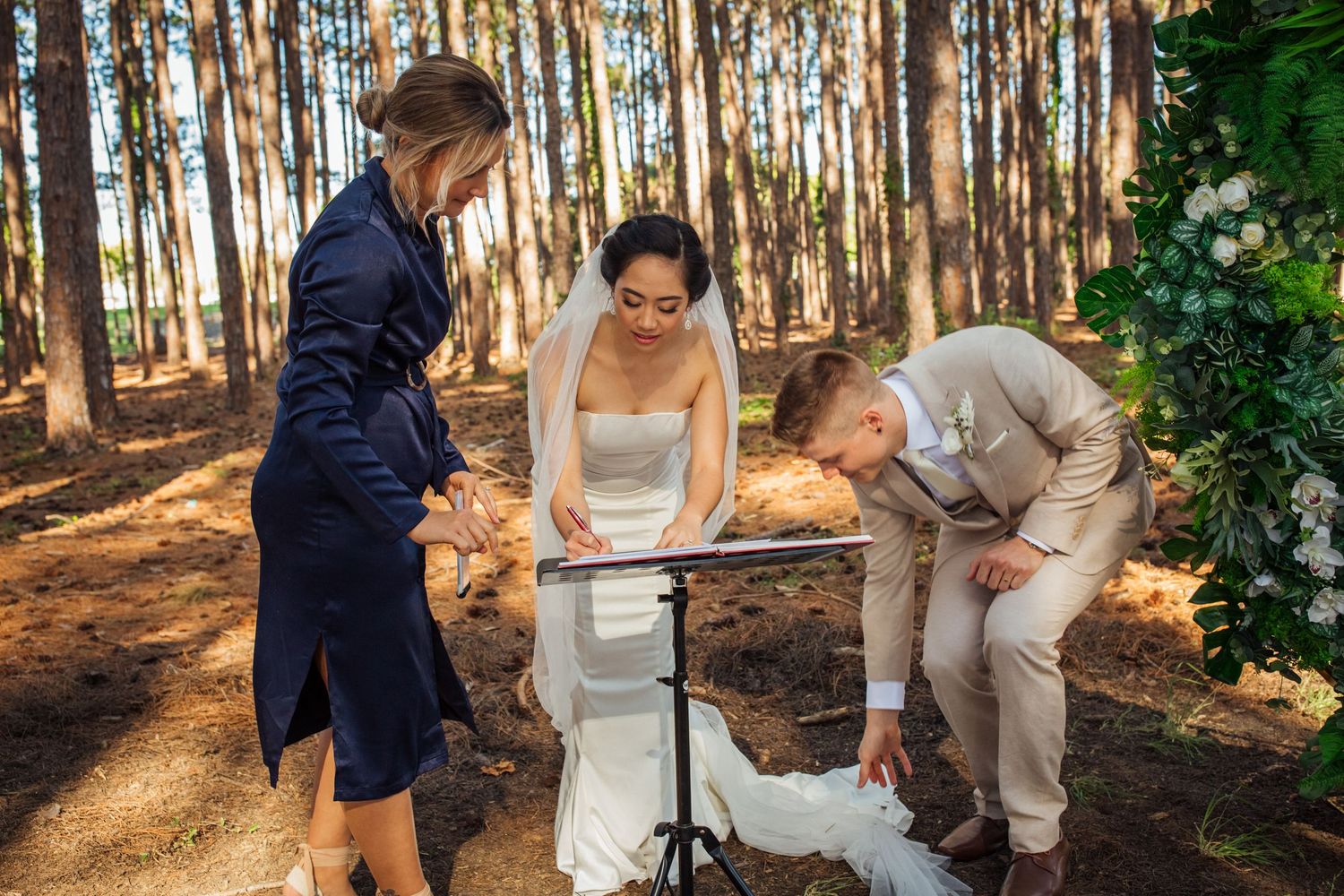 Wedding ceremony candid moments captured in a sunlit forest setting.pizzey park wedding Gold Coast