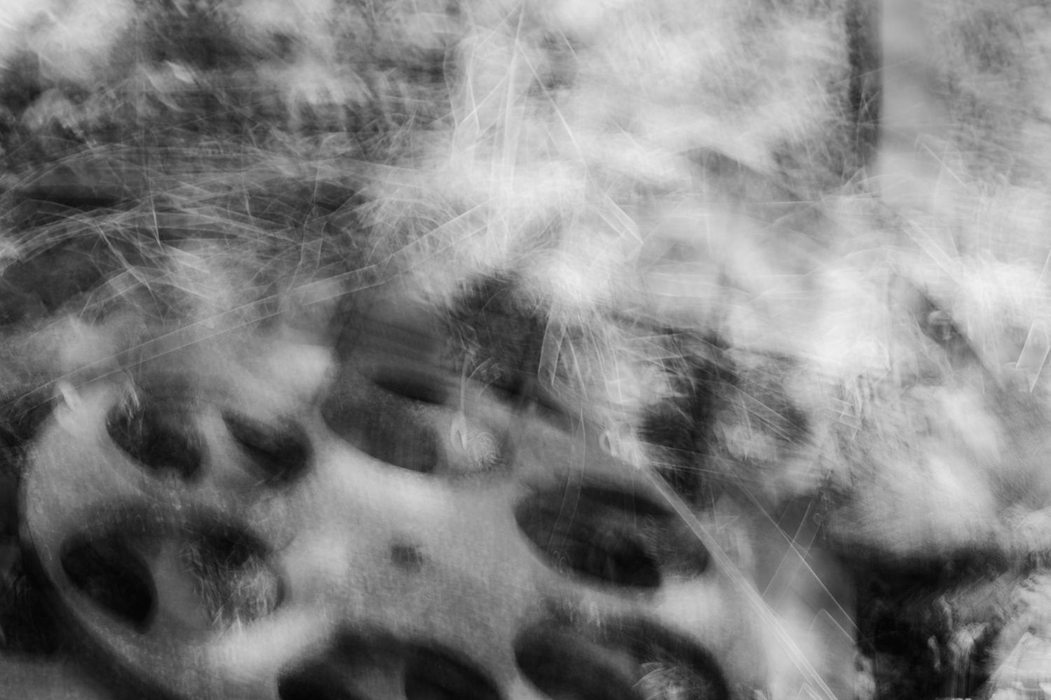 Black and white abstract clouds with dramatic contrast patterns.