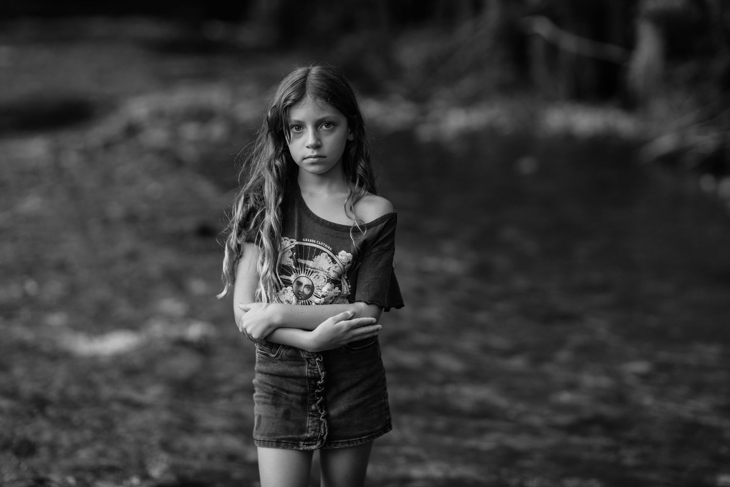 Children standing together outdoors in natural lighting.Gold Coast candid family photographer.
